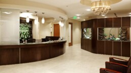 A lobby of a hotel with beautiful brown decorations