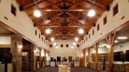 A large room with vaulted ceilings and lights.